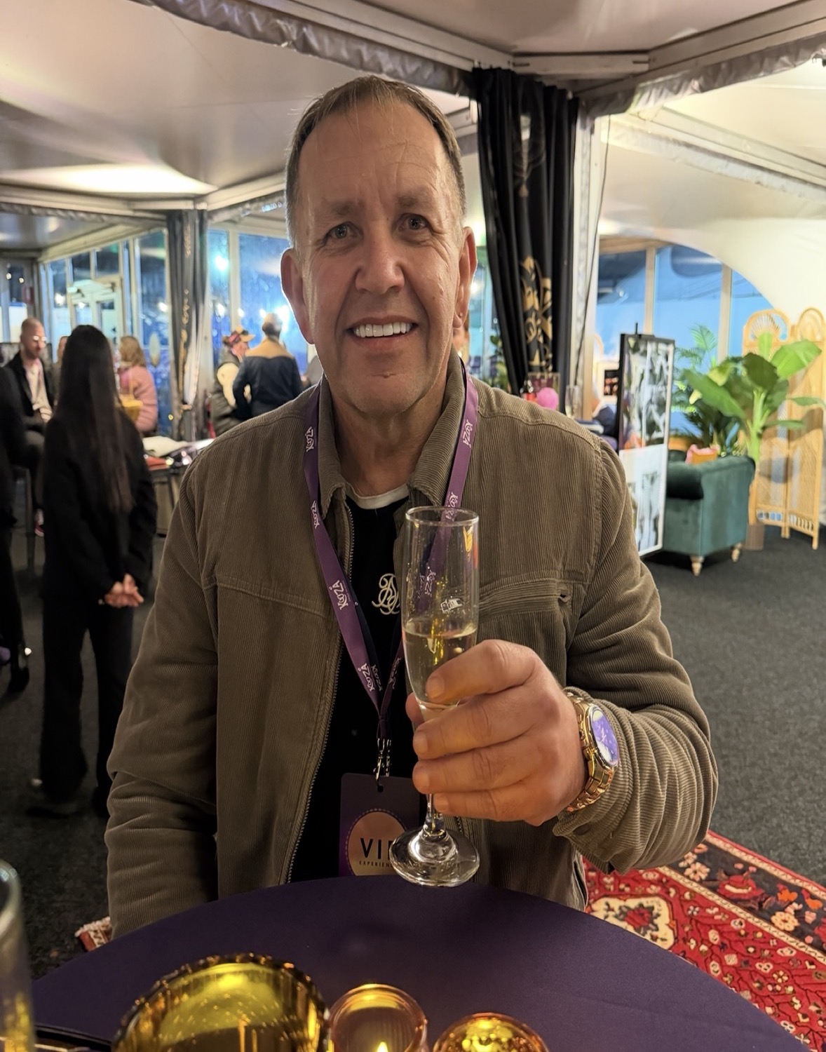 Petr Skvaril — founder of Lose To Win, celebrating with champagne